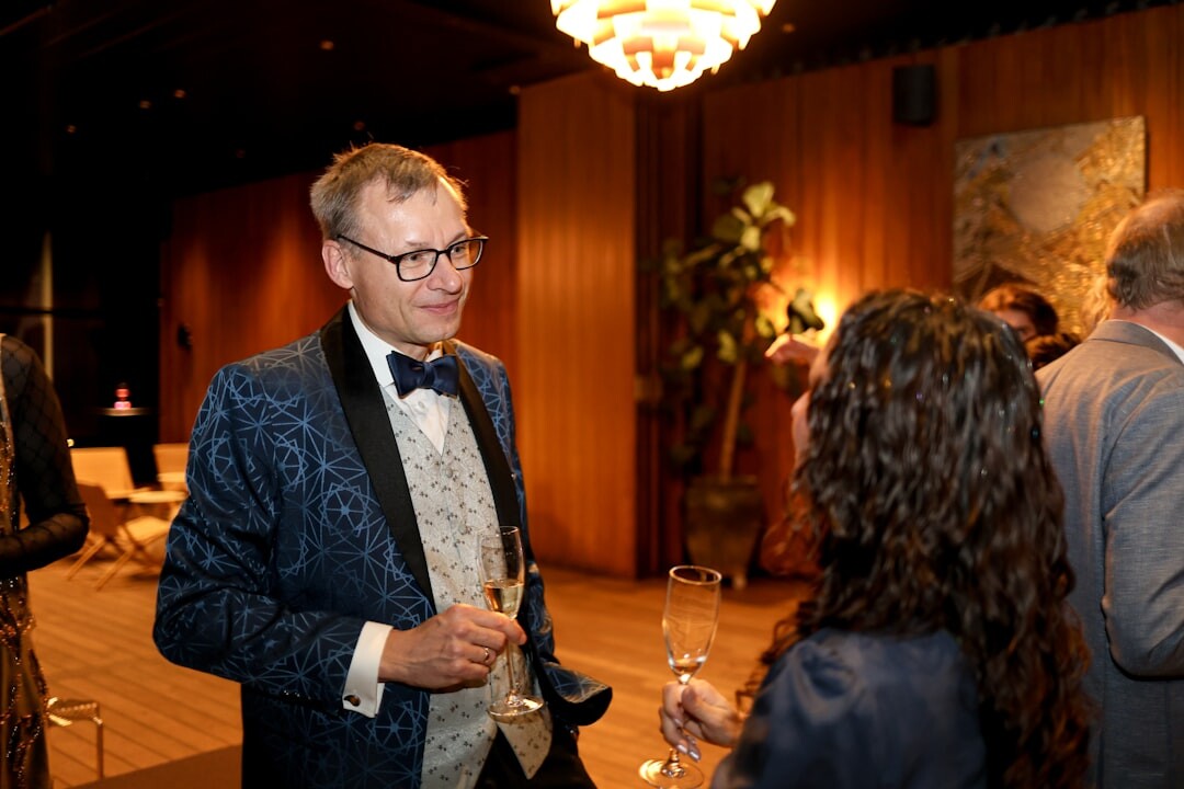 Professional networking event with colleagues talking